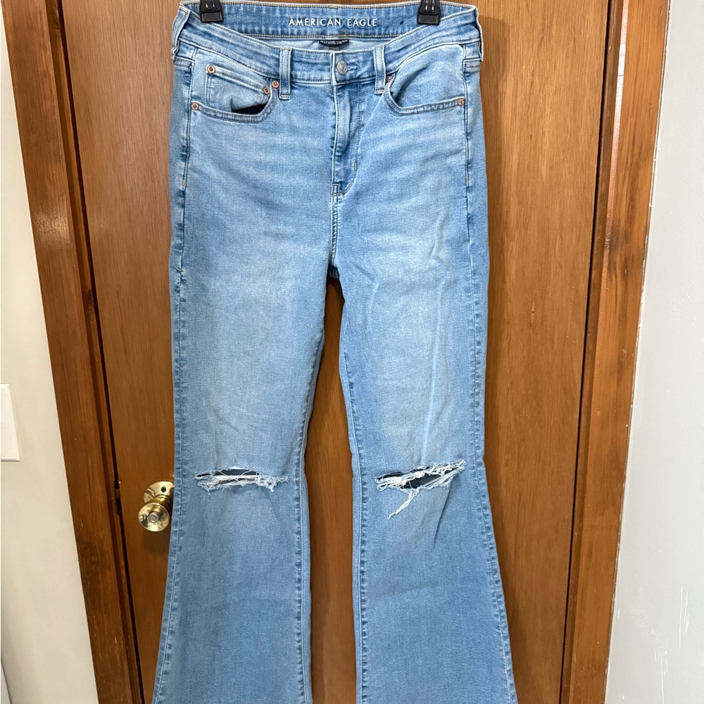 American Eagle Outfitters Light Blue Flare Jeans with Knee Rips